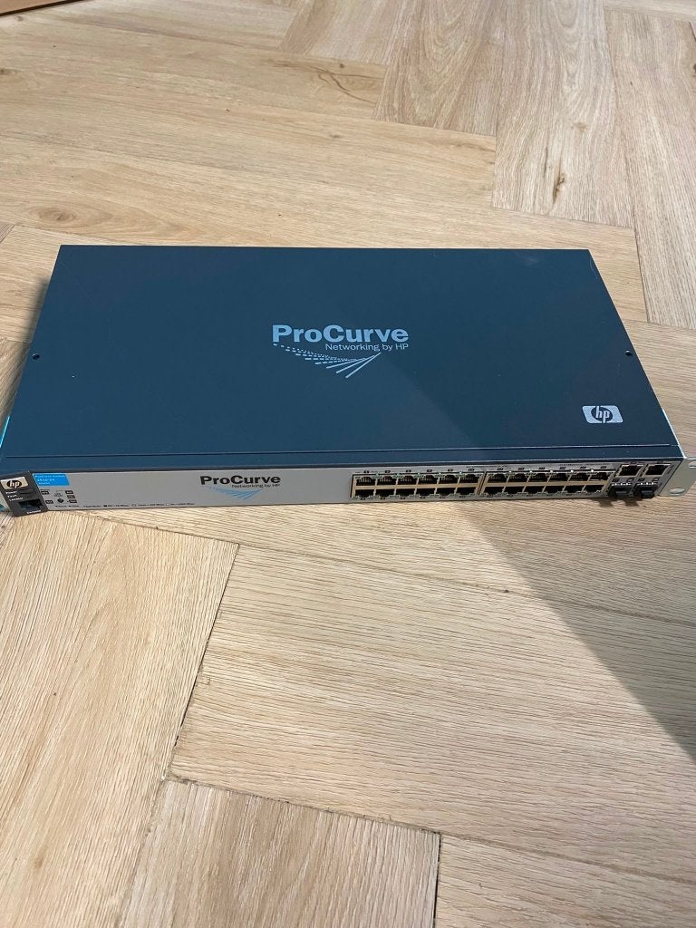 HP ProCurve Switch 2610-24 19 inch J9085A, Computers en Software, Netwerk switches, Ophalen of Verzenden, Zo goed als nieuw