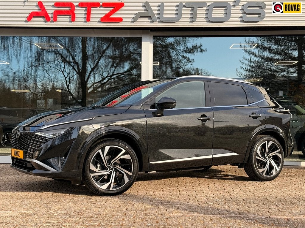 Nissan Qashqai 1.3 MHEV Xtronic Tekna Plus I Massage I H.U.D, Auto's, Nissan, Zwart, 4 cilinders, Zwart, 1365 kg