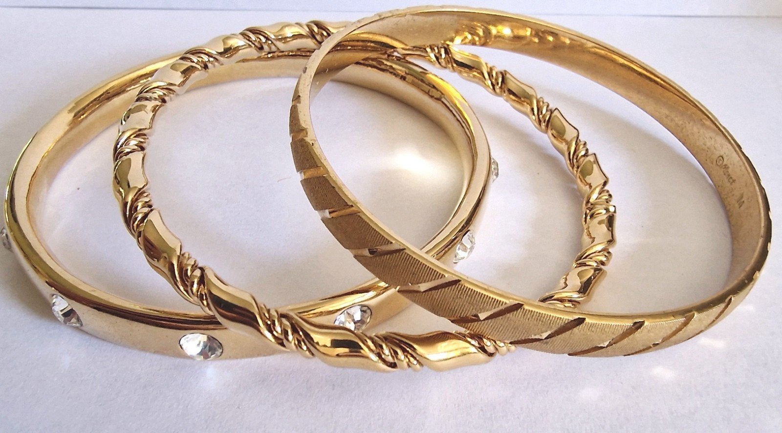 Vintage Monet armbanden – goudkleurig – set van 3, Ophalen of Verzenden, Zo goed als nieuw, Goud, Overige materialen