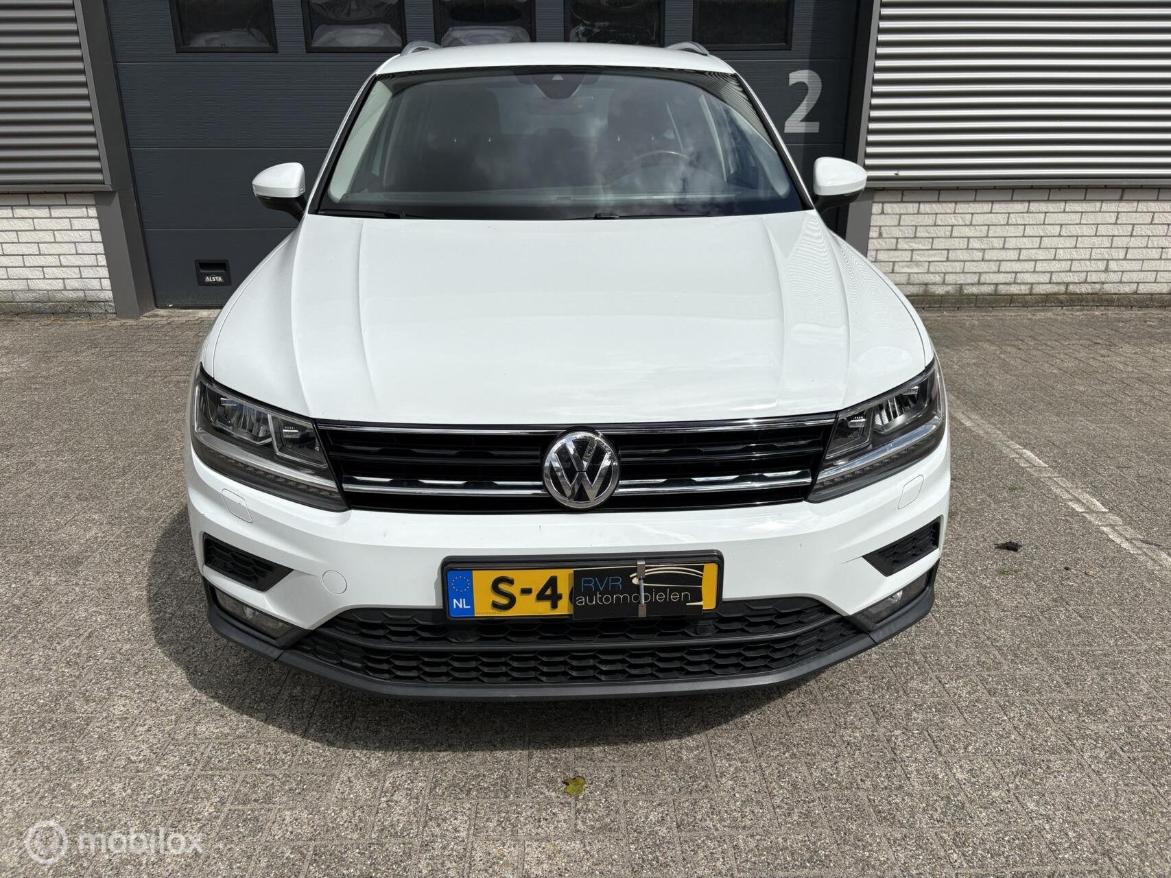 Volkswagen Tiguan 2.0 TSI 4Motion Highline / DAKSCHADE, Automaat, Stof, Gebruikt, Zwart