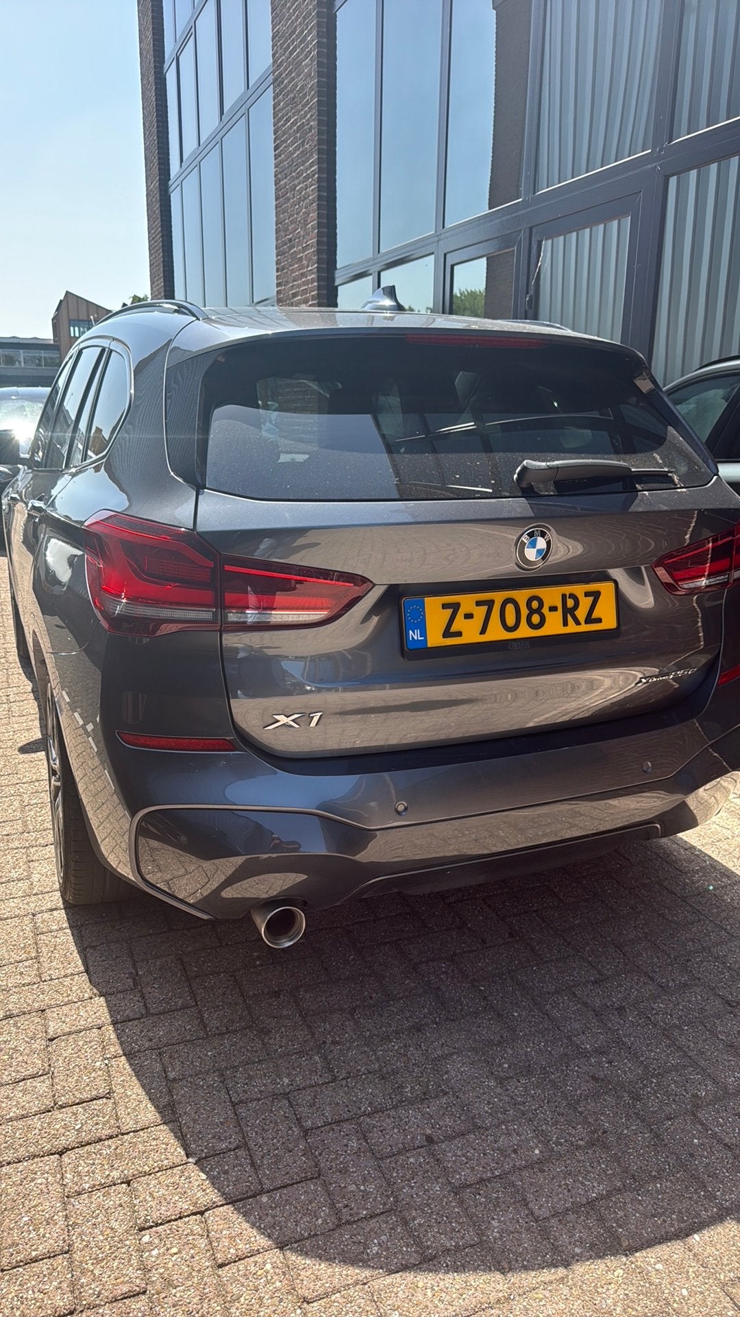 BMW X1 Xdrive25e 220pk Aut 2020 Grijs, Auto's, 125 pk, Vierwielaandrijving, SUV of Terreinwagen, 102 €/maand