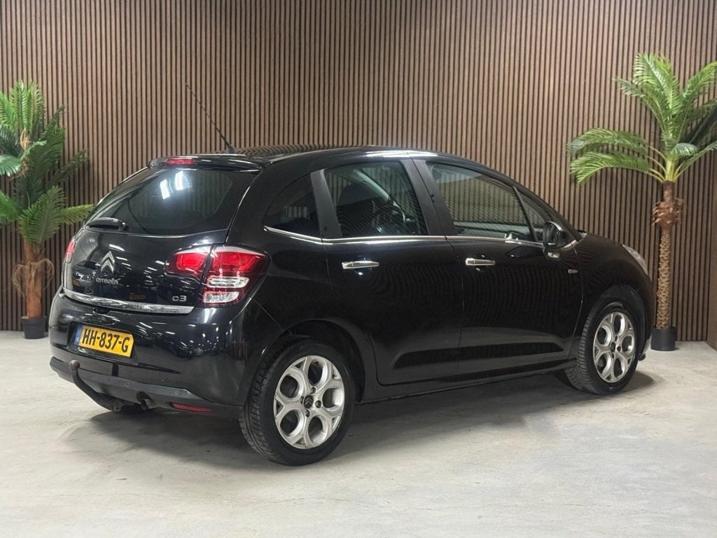 Citroën C3 1.2 PureT Exclusive (bj 2014), Auto's, Voorwielaandrijving, Stof, Gebruikt, 1199 cc