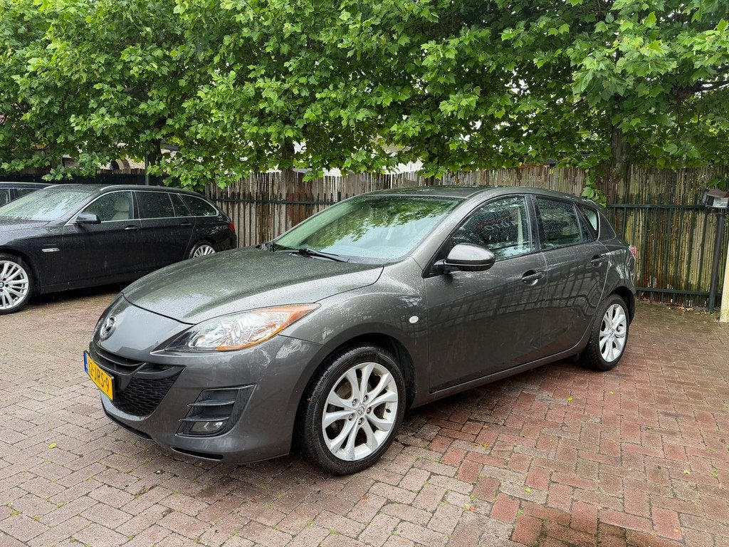 Mazda 3 1.6 TS Plus|Airco|Cruise|PDC|Stoelverw|APK 02-27|, Auto's, Mazda, Voorwielaandrijving, Stof, Gebruikt, Zwart
