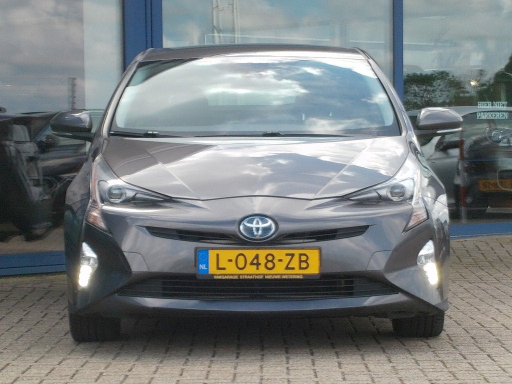 Toyota Prius 1.8 Dynamic, Trekhaak / Navigatie / Camera / St, Stof, Met garantie (alle), Stoelverwarming, 122 pk