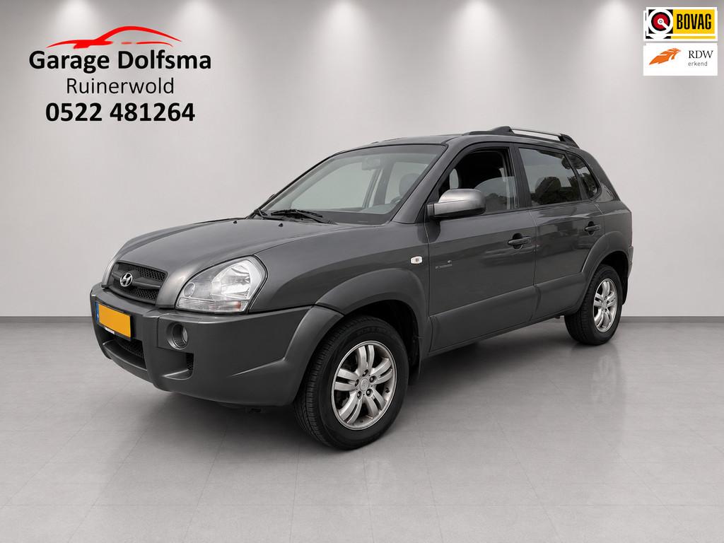 Hyundai Tucson 2.0i Style Premium-Trekhaak-leer-stoelverw-ca, Auto's, Hyundai, Gebruikt, Zwart, 4 cilinders, Handgeschakeld