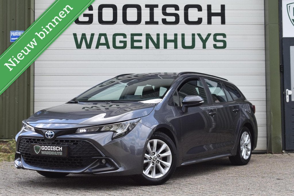 Toyota Corolla Touring Sports Hybrid 140 Active | Camera | N, Auto's, Toyota, 450 kg, 4 cilinders, Met garantie (alle), Corolla