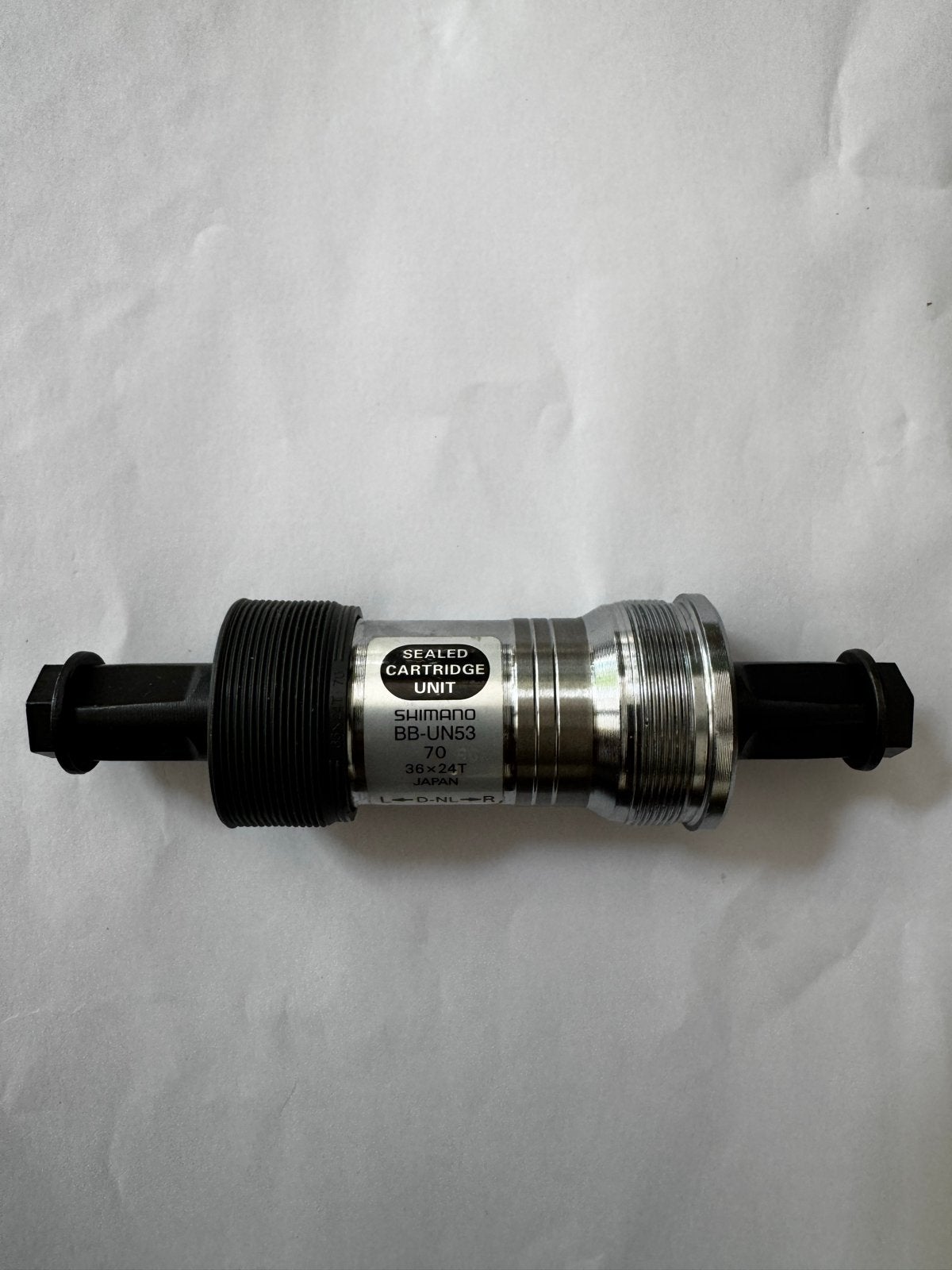 Shimano BB-UN53 Trapas - Nieuwstaat, Fietsen en Brommers, Crankstel of Pedalen, Staal, Ophalen of Verzenden, Zo goed als nieuw
