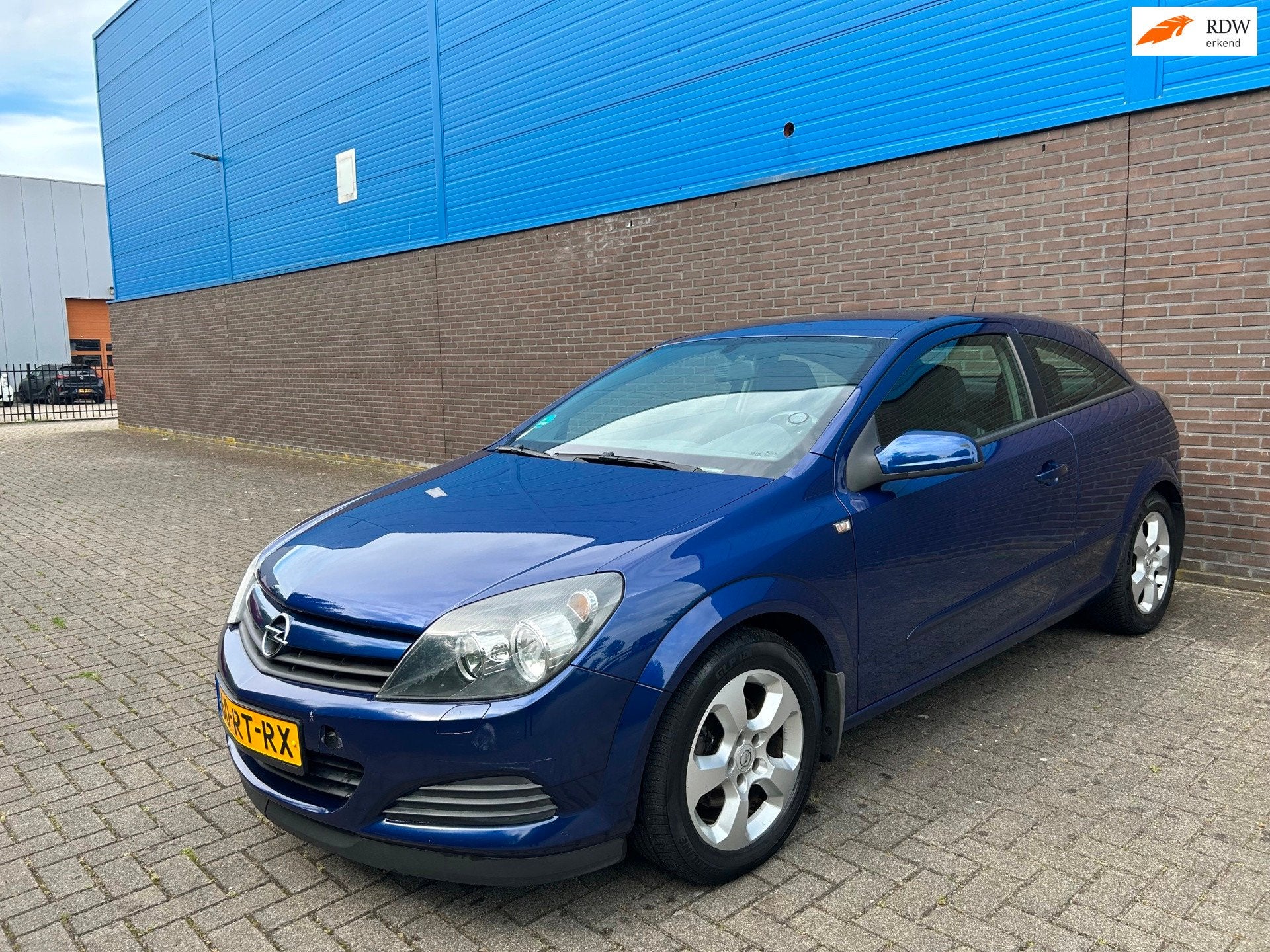 Opel Astra GTC 1.6 Enjoy | Trekhaak | Camera | Navigatie | C, Auto's, Opel, Voorwielaandrijving, 15 km/l, 4 cilinders, 620 kg