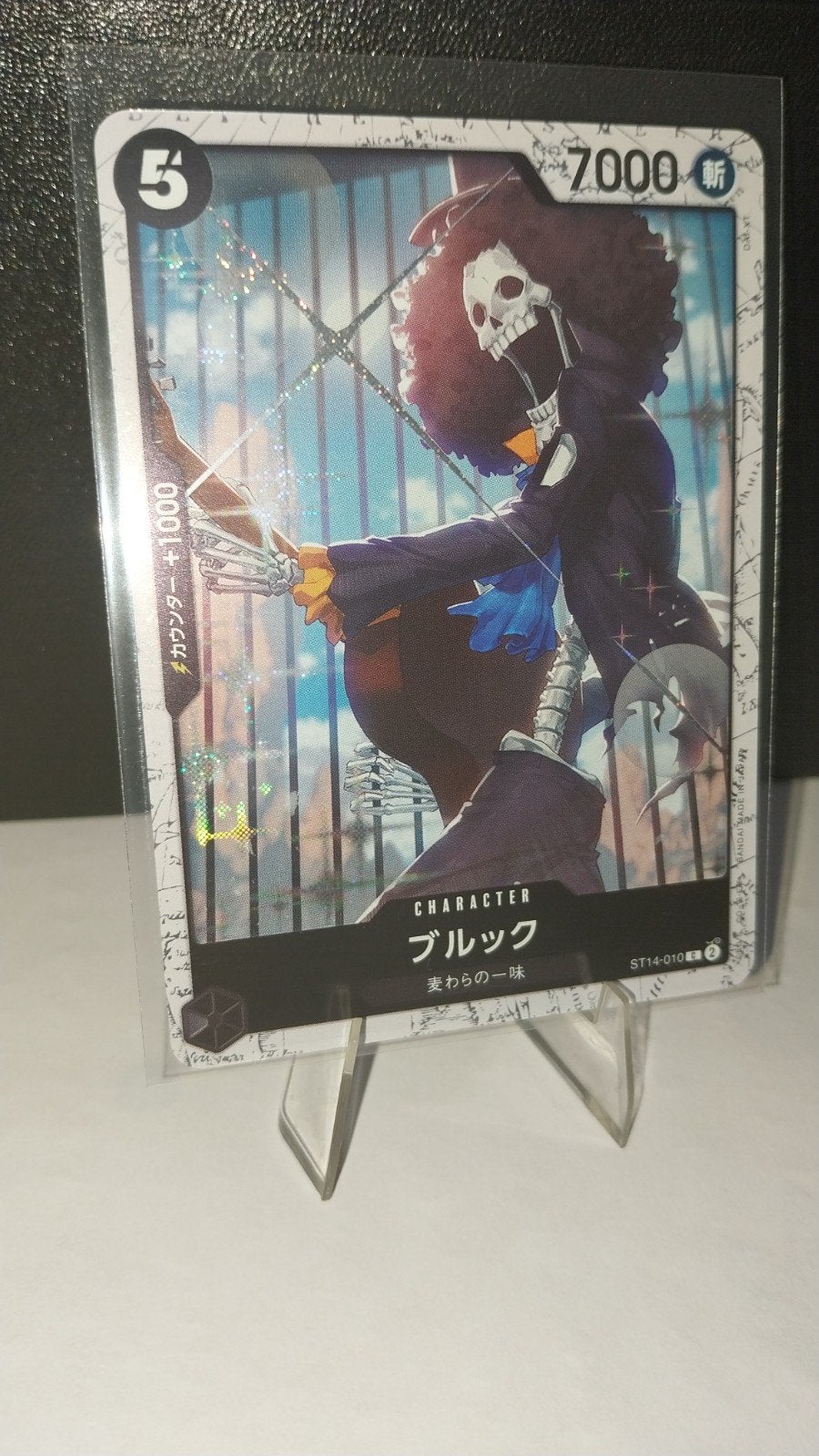 One Piece Kaart Brook (C) ST14-010 - Japanse Editie, Spelerskaart, Bandai Co., Ltd., 5-37-8, Asakusa, Taito-ku, Tokyo 111-8081, Japan
