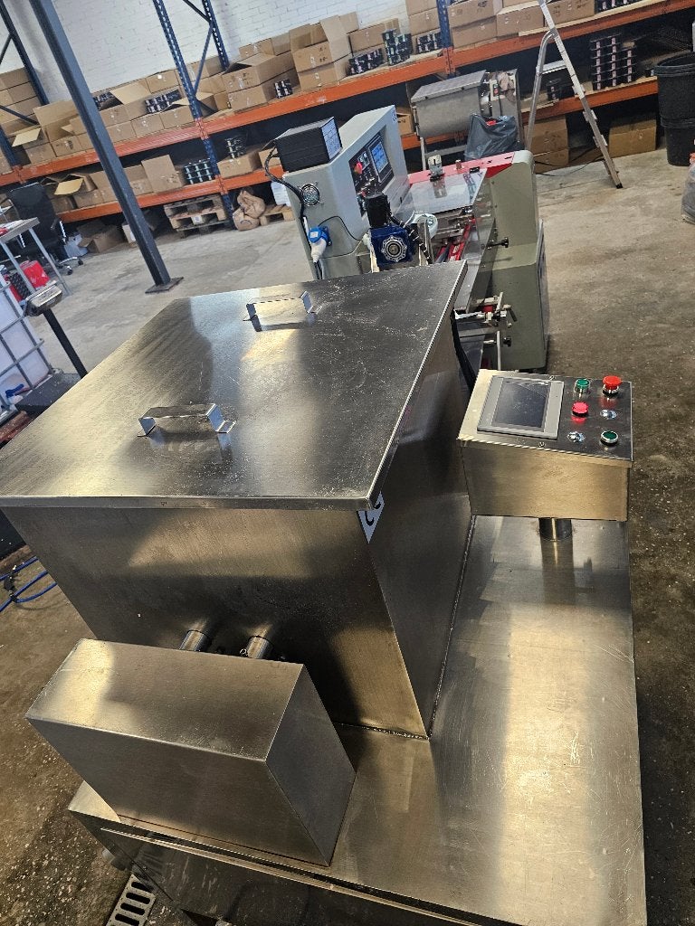 Complete verpakkings-/extruderlijn (extruder + flow‑pack), Ophalen