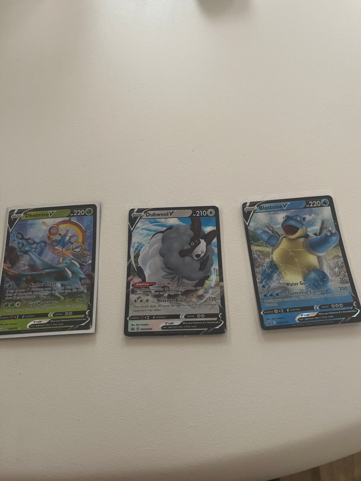 5 Pokémon V kaarten: Blastoise, Dhelmise, Dubwool, Inteleon,, Ophalen of Verzenden, Zo goed als nieuw, Meerdere kaarten