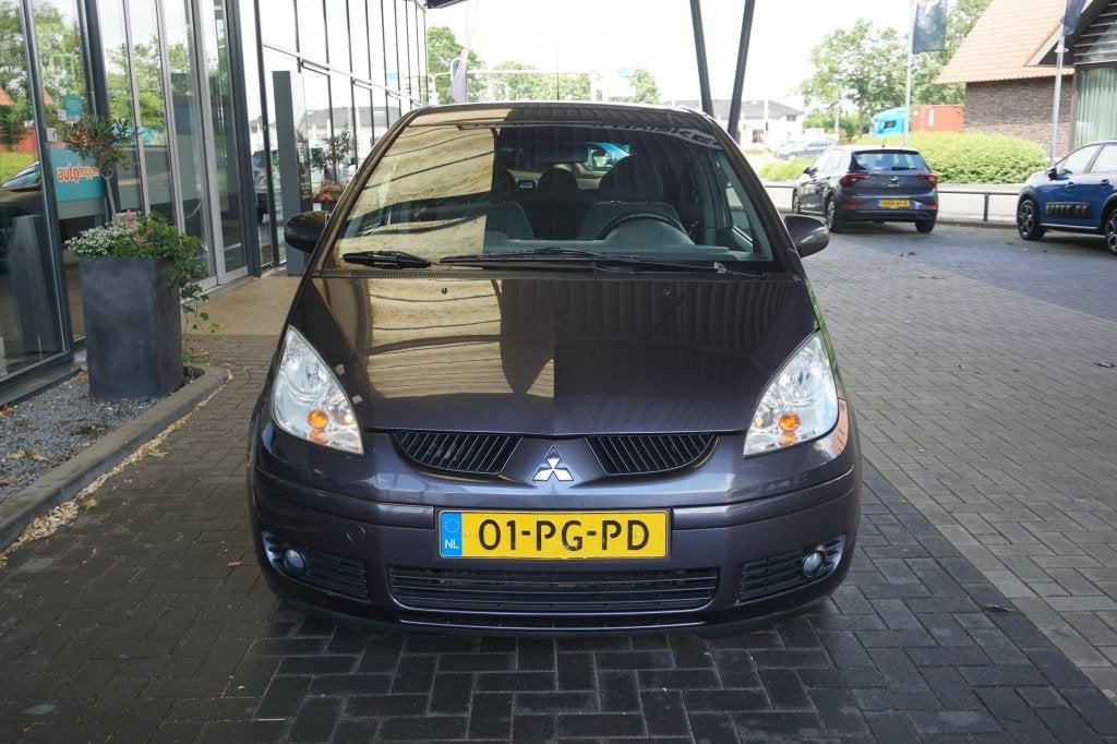 Mitsubishi Colt 1.3 Inform Cool Pack Plus Automaat | Afn. Tr, Auto's, 12 maanden, Stof, Gebruikt, 31 €/maand