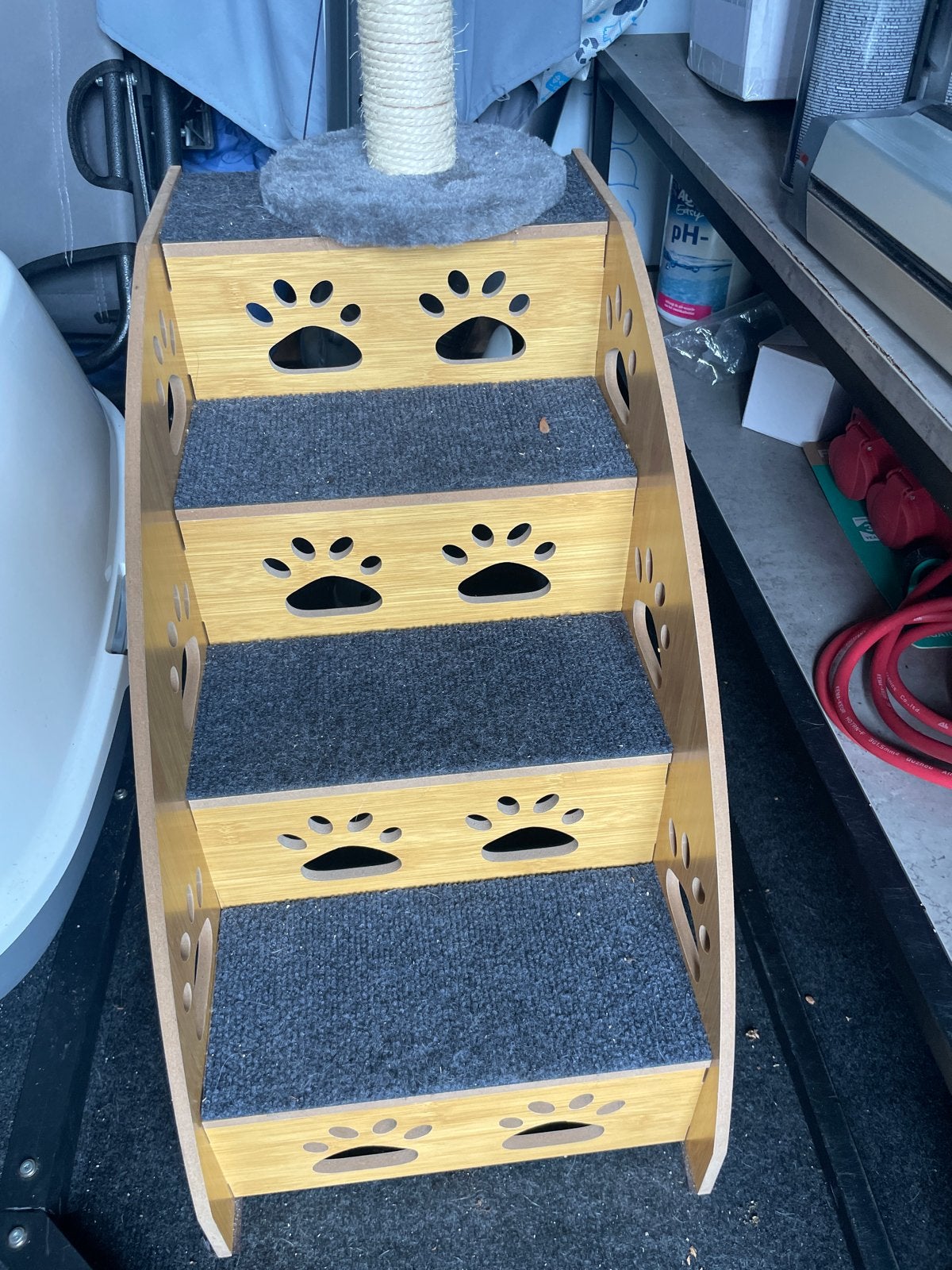 Trapje voor kat of kleine hond, Ophalen