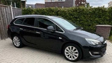 Opel Astra 1.4 Turbo 88KW Sports Tourer 2013 Zwart, Voorwielaandrijving, Stof, Navigatiesysteem, Zwart