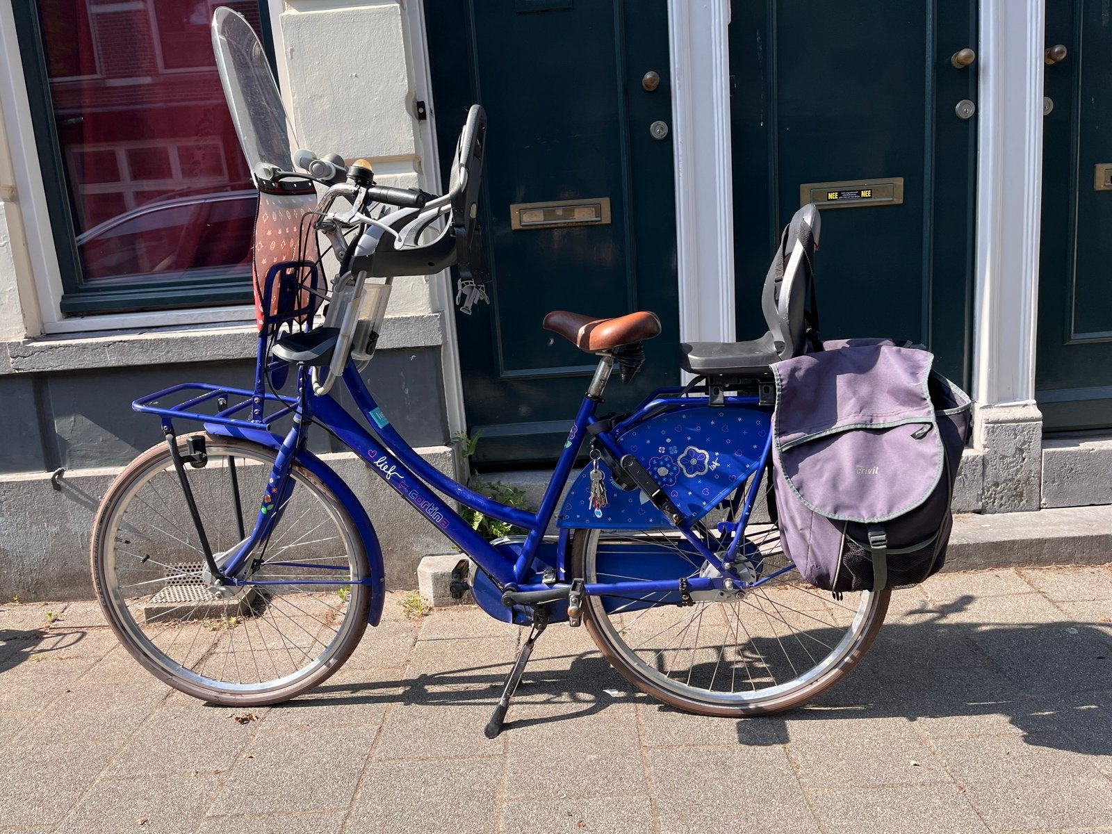 Fiets met Bobike voorzitje en achterzitje, Ophalen, Gebruikt, Voetsteuntjes, Voorzitje