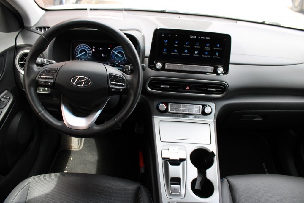 Hyundai KONA EV Premium 64 kWh | Org NL | Led | Elek Stoelen, Auto's, Hyundai, 0 cilinders, Gebruikt, Zwart, Wit