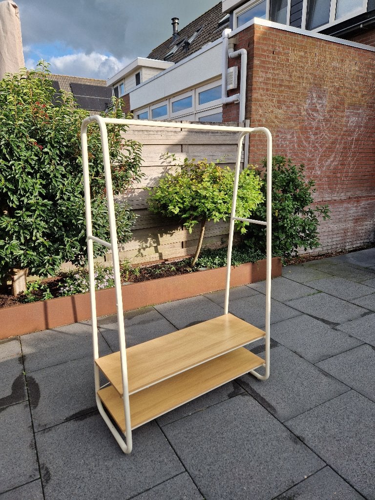 kledingrek, Ophalen, Zo goed als nieuw