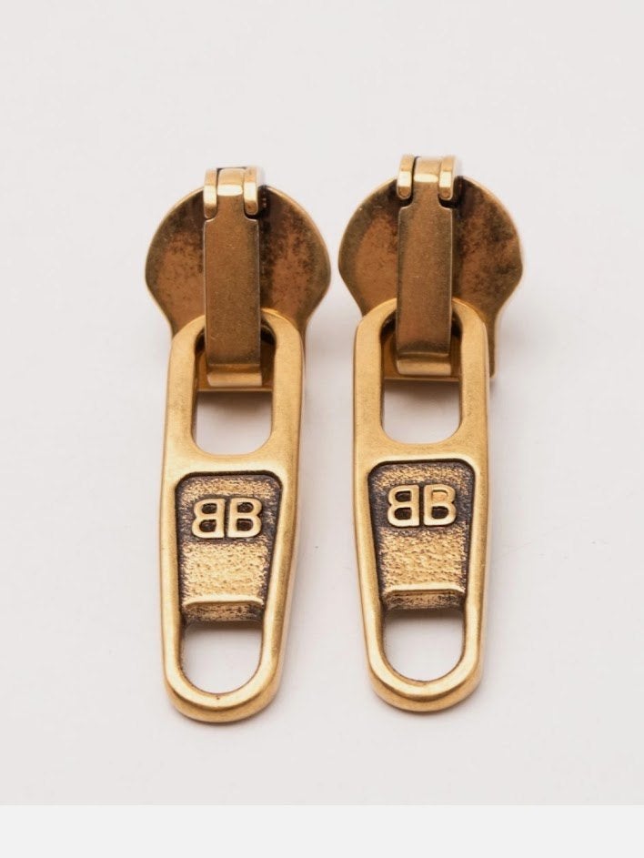 Balenciaga rits oorbellen zo grappig wel groot brass in doos, Overige materialen, Hangers, Nieuw, Ophalen of Verzenden