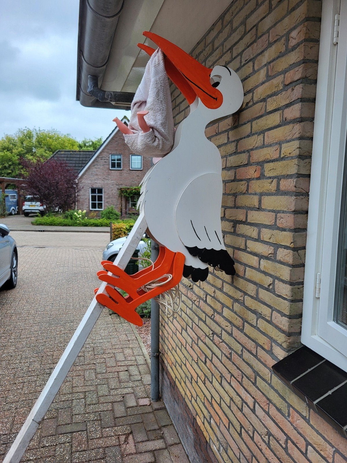 Geboorte ooievaar voor in de tuin, Ophalen, Hout