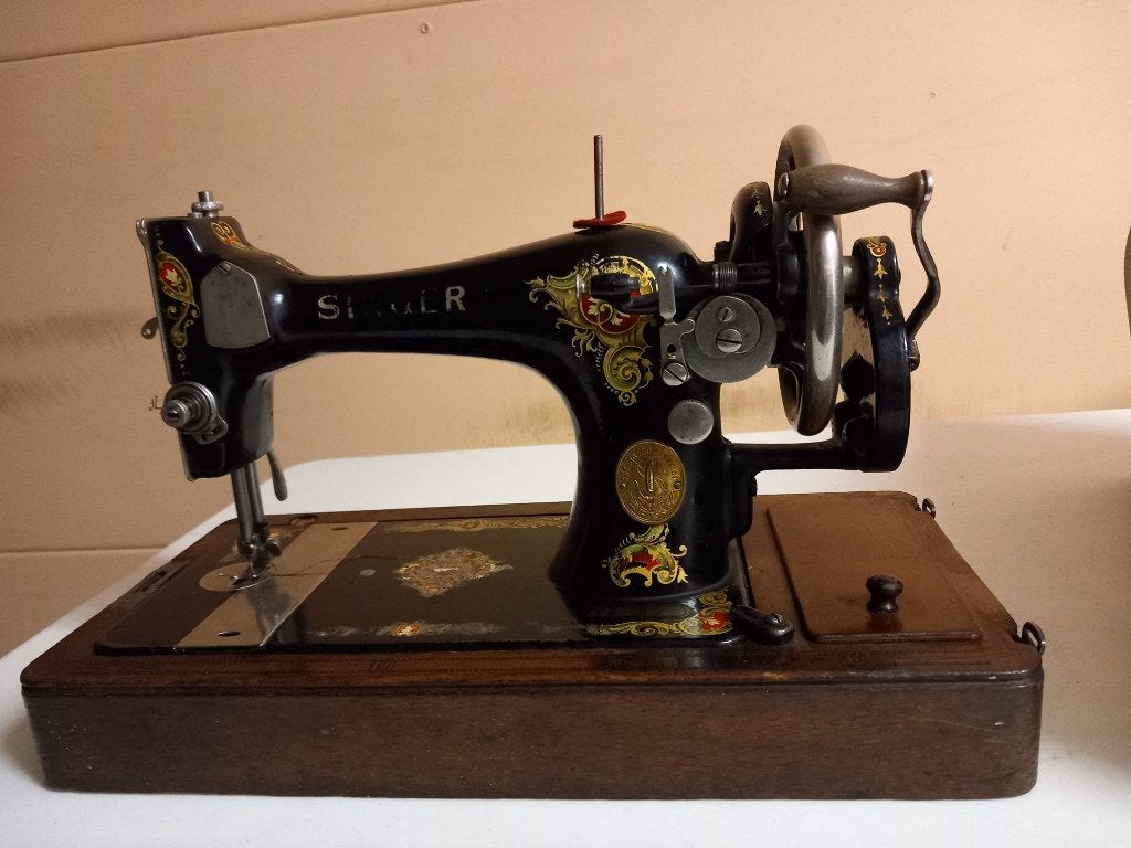 singer handnaaimachine, Ophalen