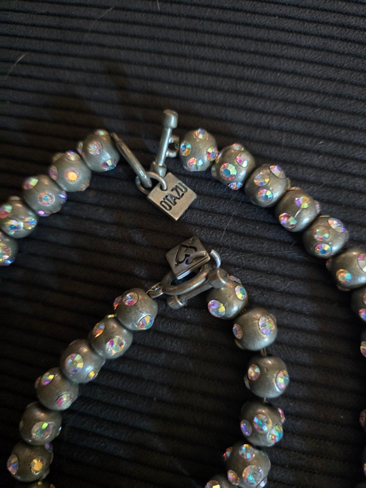 Otazu armband en ketting set - missen steentjes, Overige materialen, Gebruikt, Met strass, Ophalen of Verzenden