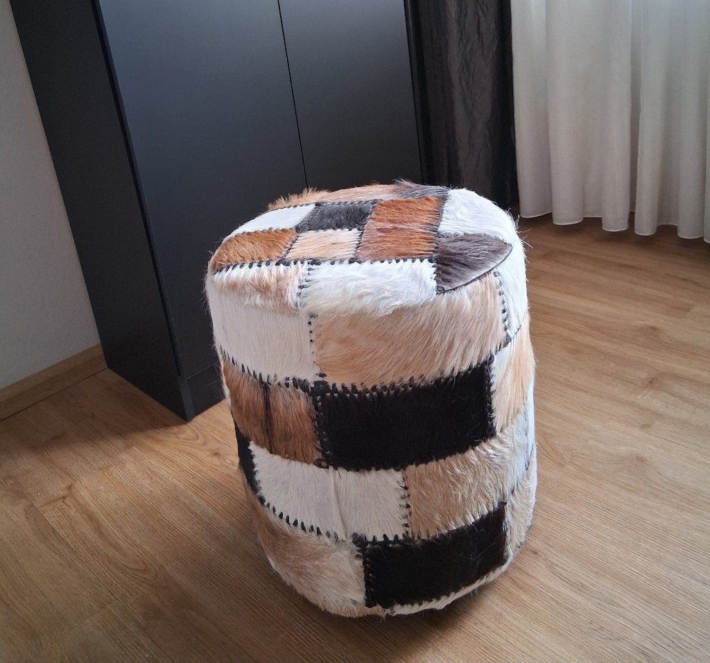 Poef van koeienhuid als nieuw., Ophalen, Overige materialen, Minder dan 50 cm, Rond
