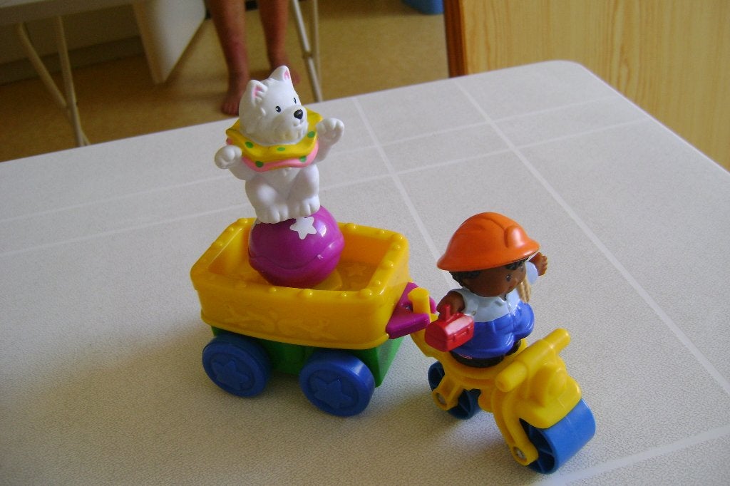 fischer price scooter met ronddraaiende poes met aanhanger, Ophalen of Verzenden, Zo goed als nieuw, Speelset