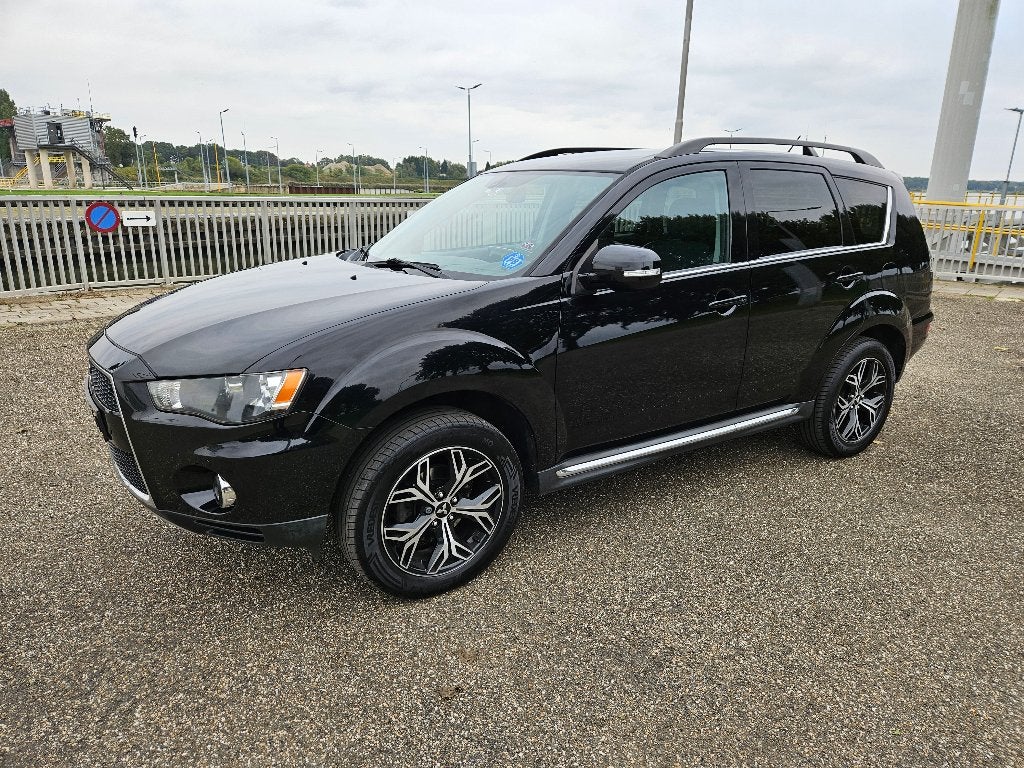 Mitsubishi Outlander 2.0 MPI 2WD CVT 2011 Zwart, Auto's, 1998 cc, Outlander, Zwart, 4 cilinders