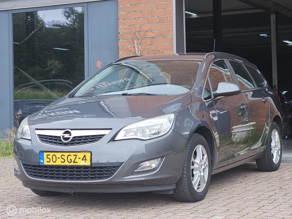 Opel Astra Sports Tourer 1.4 Edition, Auto's, Opel, Voorwielaandrijving, Euro 5, 101 pk, Gebruikt