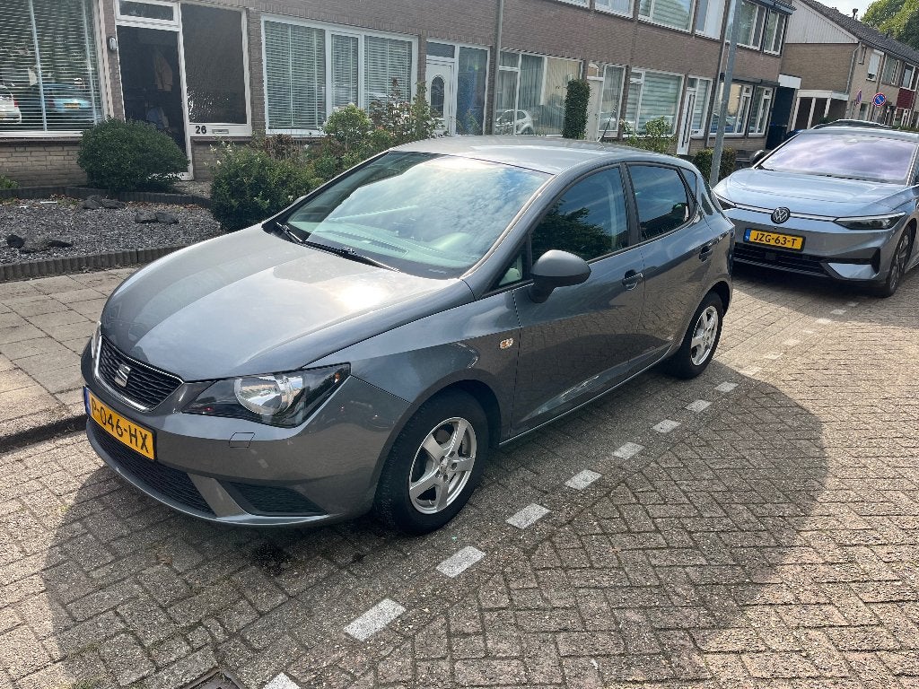 Seat Ibiza 1.2 51KW 5DRS 2015 Grijs, Voorwielaandrijving, Stof, Stoelverwarming, 1198 cc