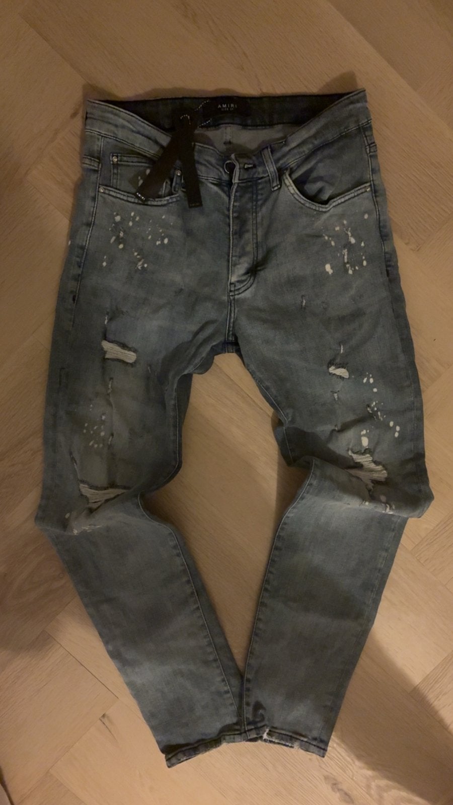 Amiri Jeans met verfspatten en scheuren, Kleding | Heren, Spijkerbroeken en Jeans, Ophalen of Verzenden, Zo goed als nieuw, Blauw