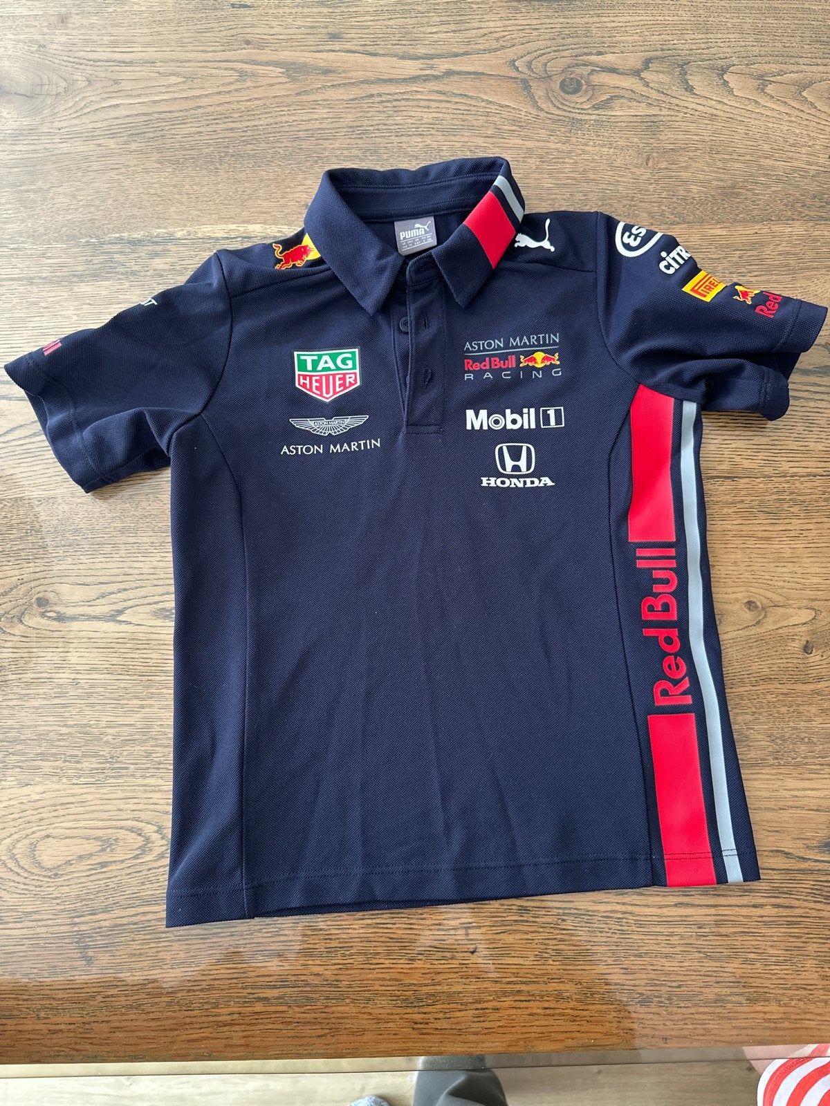 Puma Red Bull Racing Polo Shirt - Maat 116 (5-6 jaar), Ophalen of Verzenden, Zo goed als nieuw, Jongen of Meisje, Shirt of Longsleeve