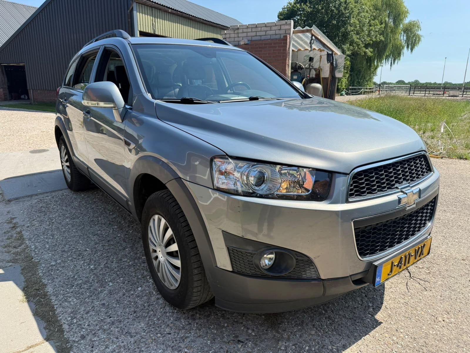 Chevrolet Captiva 2.4i LT 2WD 7 pers, Voorwielaandrijving, Euro 5, Gebruikt, Zwart