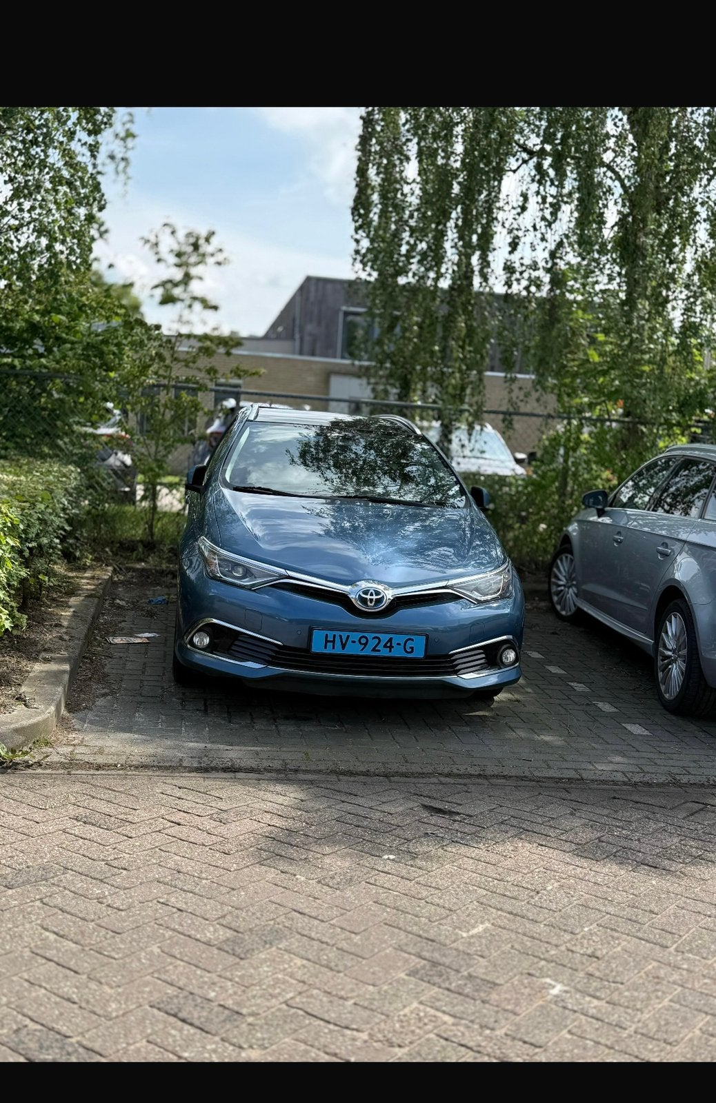 Toyota Auris 1.8 Hybrid Touring Sports CVT 2015 Blauw, 28 km/l, Zwart, 4 cilinders, Blauw