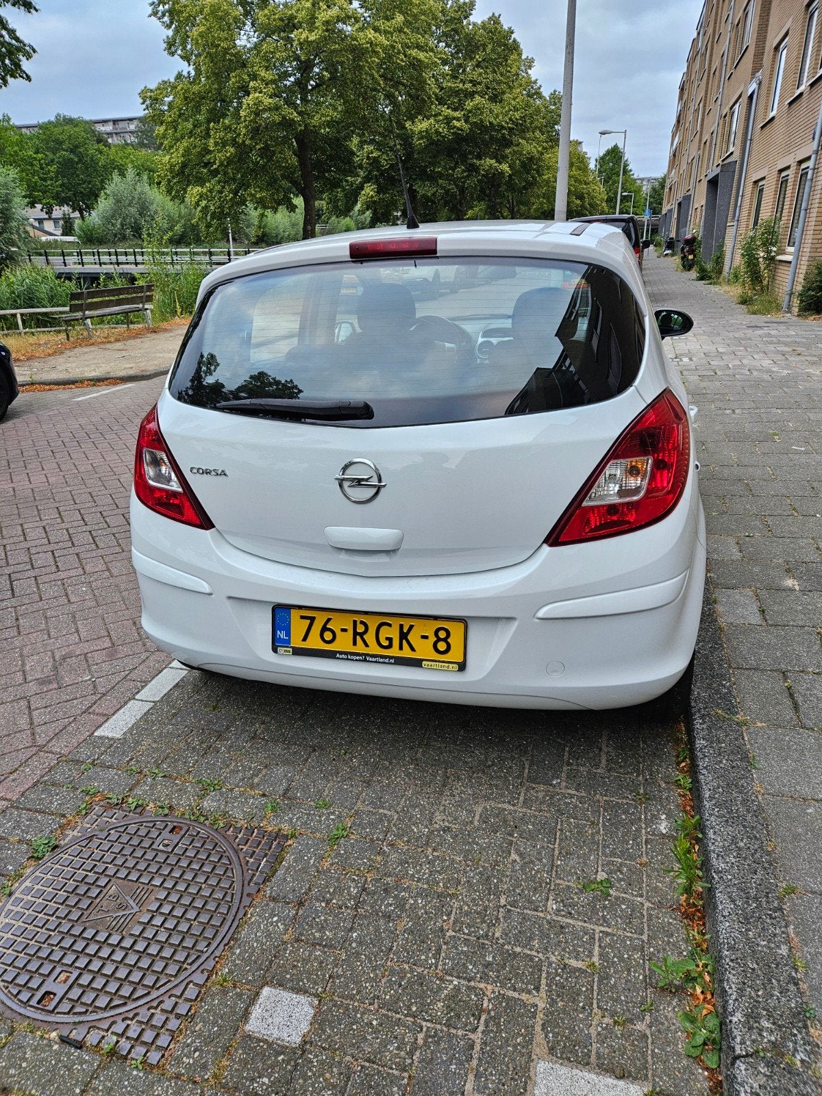 Opel Corsa 1.0 12V 5D 2011 Wit, Auto's, Euro 5, Stof, 40 €/maand, 1045 kg