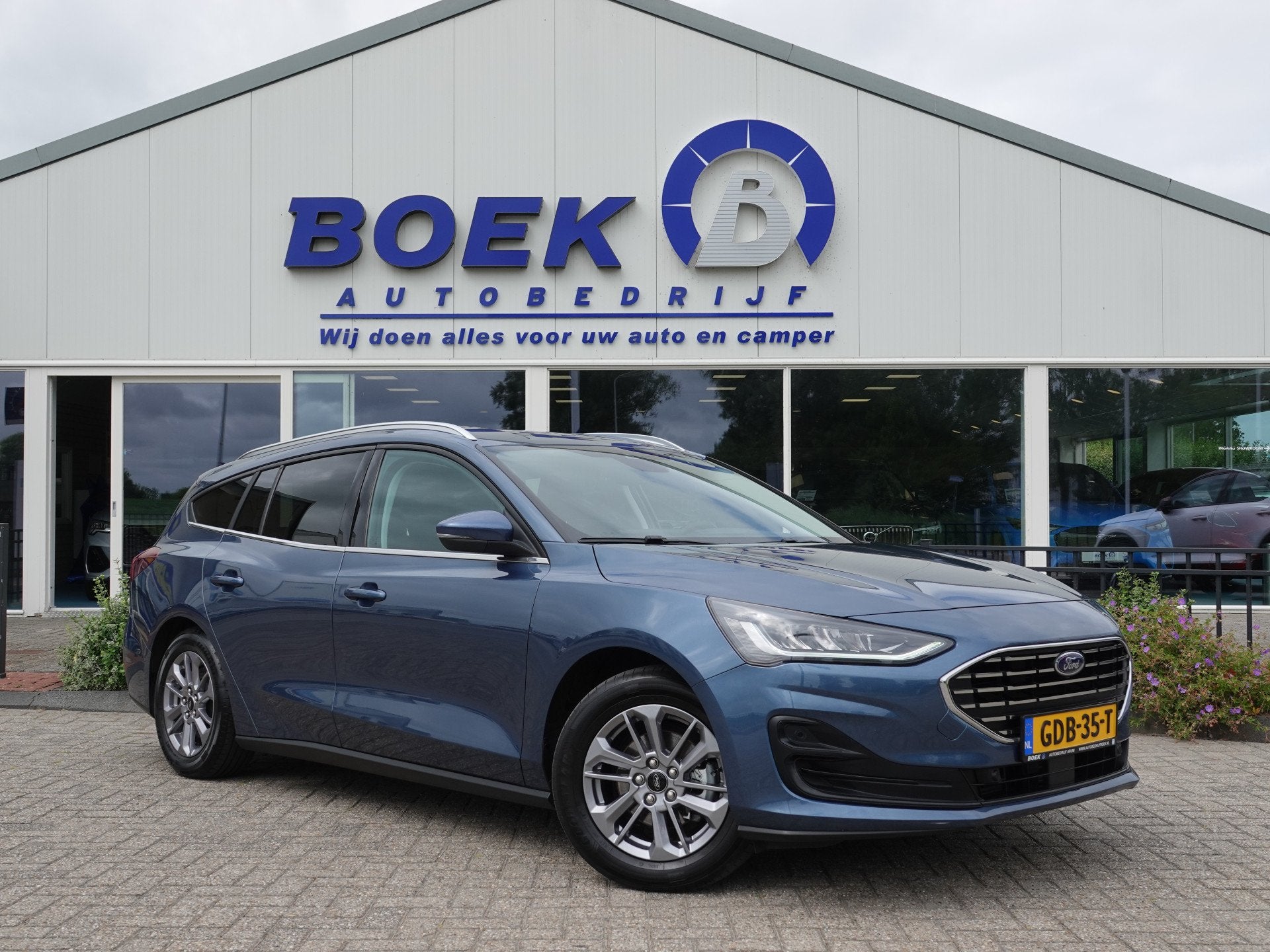 Ford FOCUS Wagon 1.0 EcoBoost Hybrid Titanium AUTOM. | PDC V, Auto's, Stof, Gebruikt, Euro 6, Blauw
