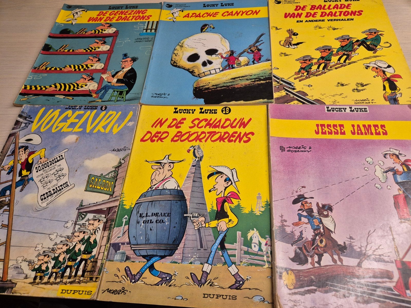 6 Lucky Luke in keurige staat Nederlands ruggen prima, Eén stripboek, Ophalen of Verzenden, Zo goed als nieuw