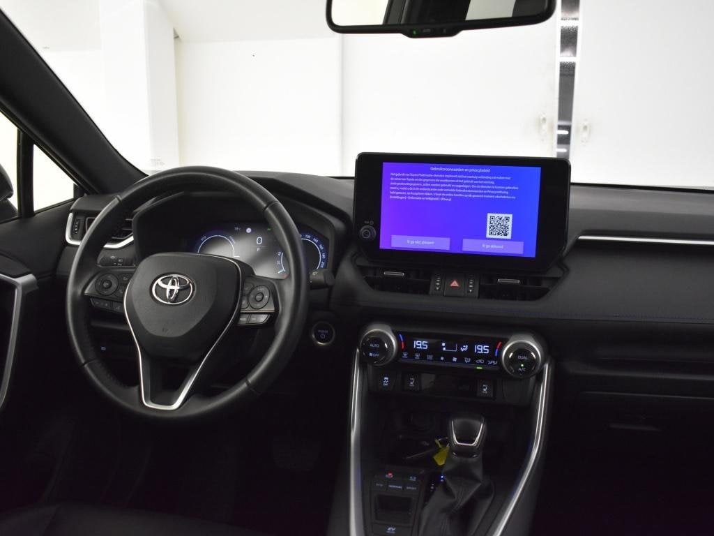 Toyota RAV4 2.5 Hybrid Style Bi Tone | Elektr. a. Klep | Car, Auto's, 12 maanden, Gebruikt, Leder en Stof, Verwarmde buitenspiegels
