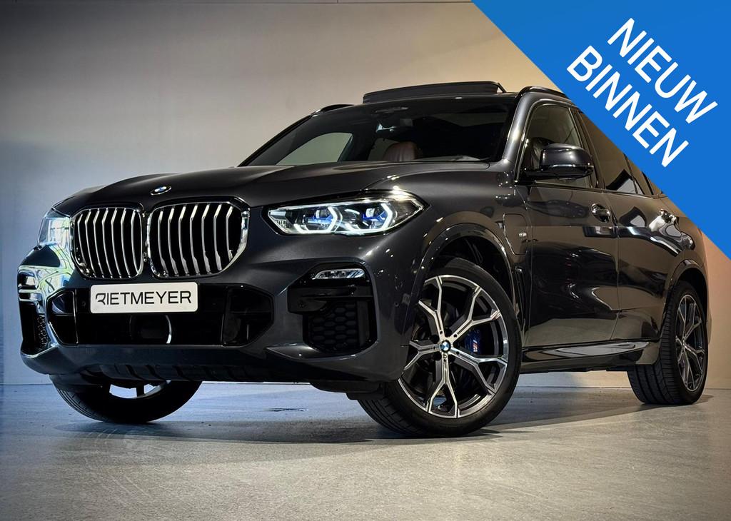 BMW X5 xDrive45e High Executive |Pano |Achterasbesturing |Lu, 12 maanden, Gebruikt, 394 pk, Hybride Elektrisch/Benzine