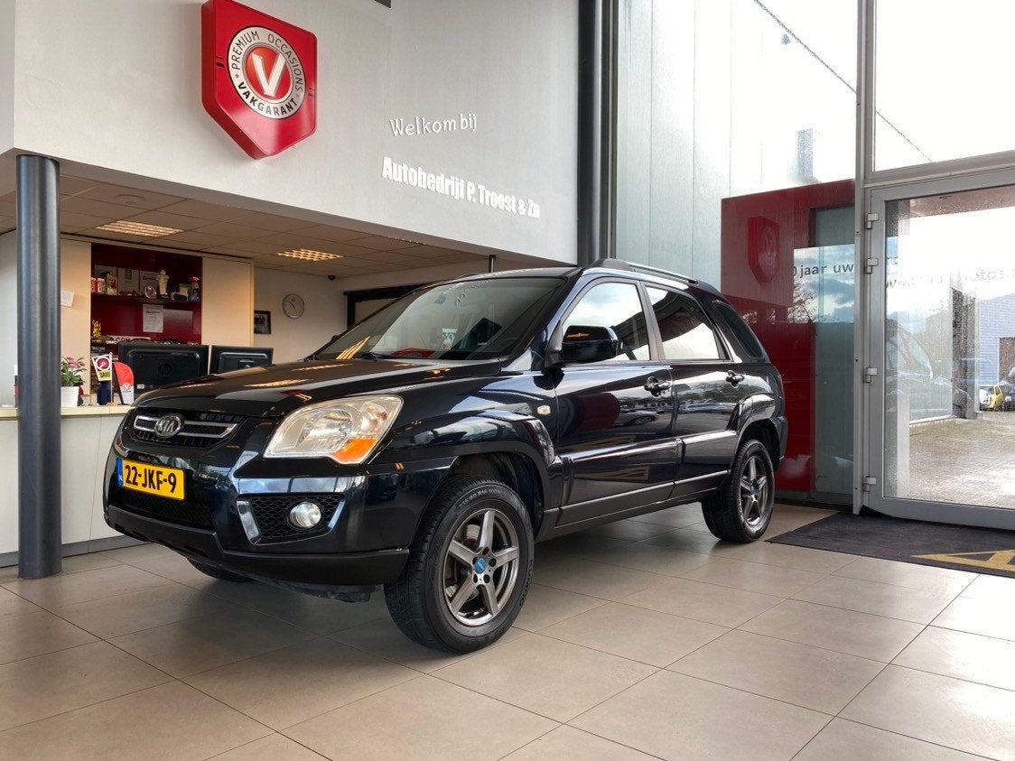 Kia Sportage 2.0 CVVT X-ecutive,Navigatie,Climate&Cruisecont, Auto's, 1442 kg, Stof, 4 cilinders, Zwart