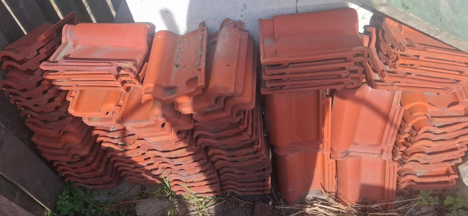Ruim 100 gebruikte dakpannen, Ophalen