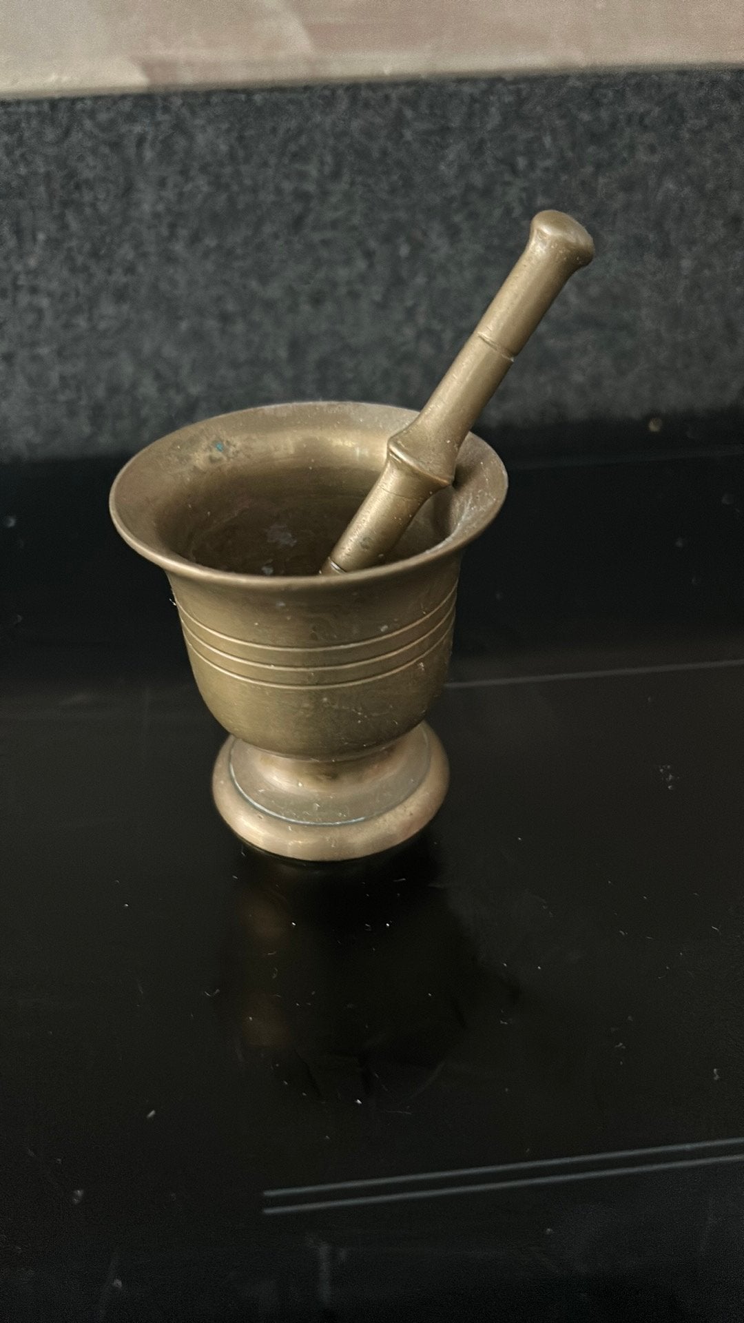 Koperen vijzel met stamper, Ophalen