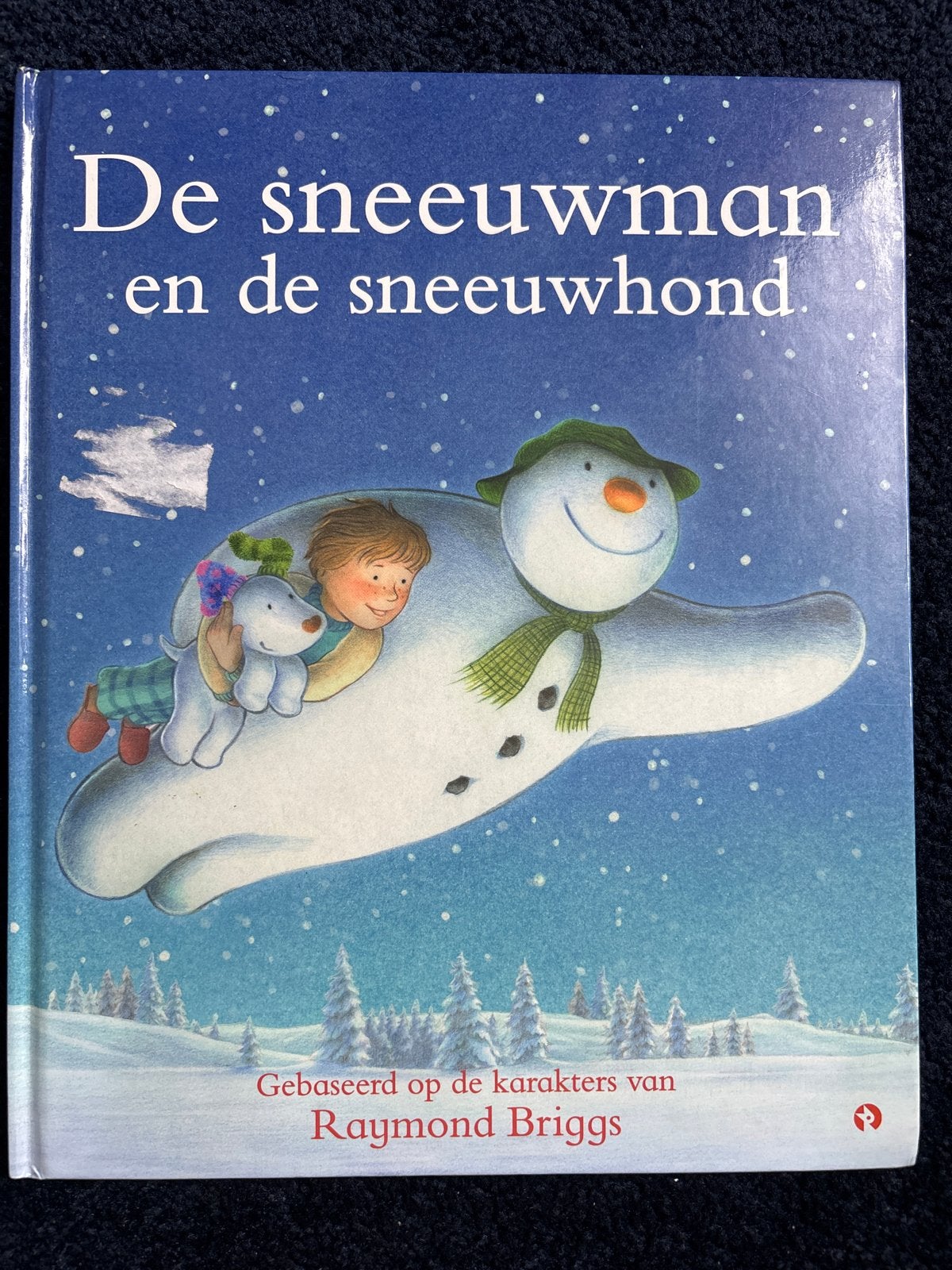De sneeuwman en de sneeuwhond - Raymond Briggs, Boeken, Ophalen of Verzenden, Zo goed als nieuw, Fictie algemeen