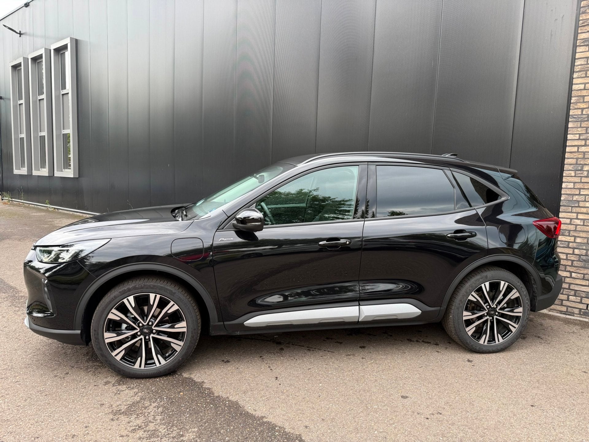 Ford Kuga 2.5 PHEV 243pk Active X Navi, Winter, HUD, Adop cr, Gebruikt, Zwart, 4 cilinders, Zwart