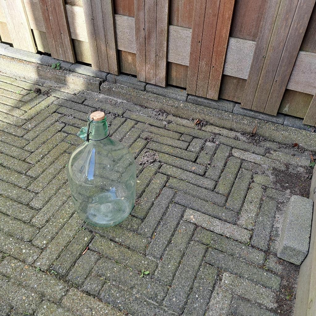 fles met dop, Ophalen