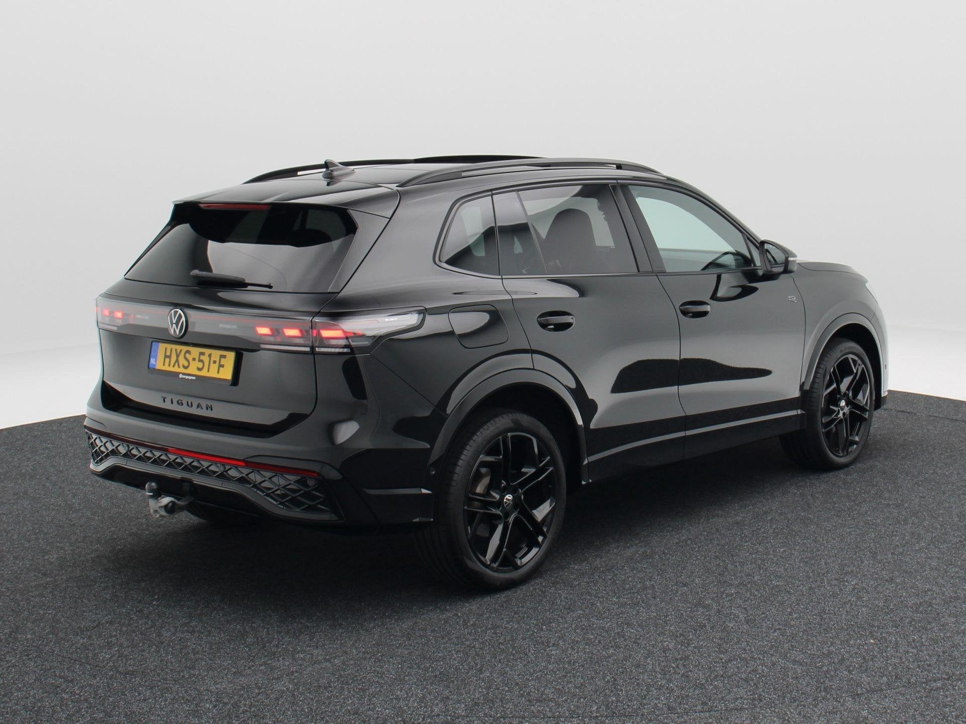 Volkswagen Tiguan 1.5 204 Pk eHybrid R-Line | Black Style |, Auto's, Stof, 150 min, Zwart, Bedrijf