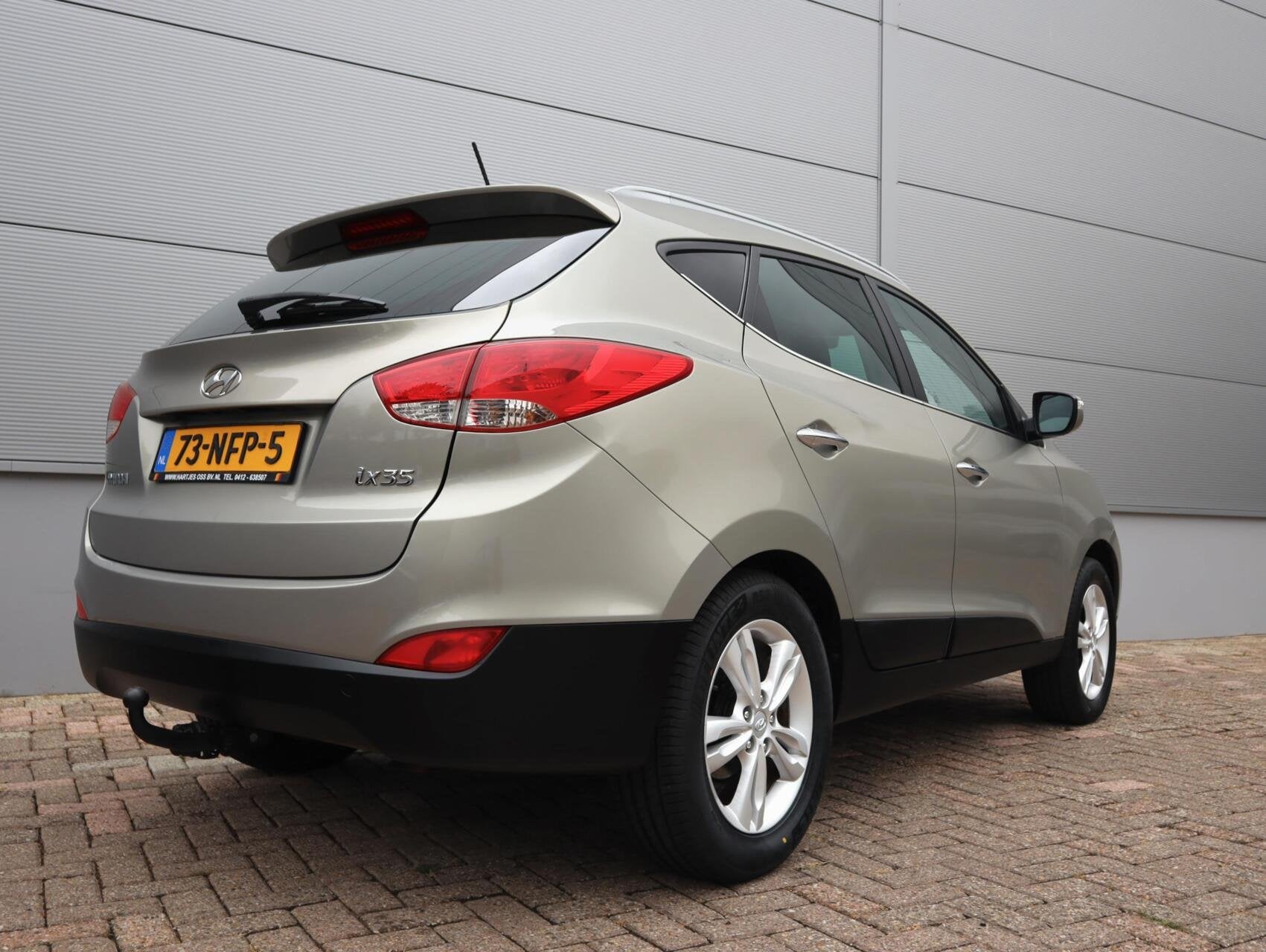 Hyundai ix35 2.0i Style (Vol-Opties!) Parelmoer NL-auto, Gebruikt, 4 cilinders, Met garantie (alle), Leder en Stof