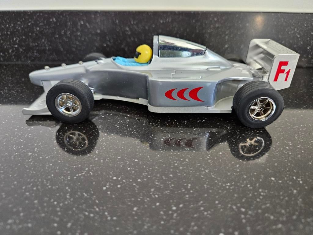 Aansteker van een fomule raceauto, Verzamelen, Automerken, Motoren en Formule 1, Ophalen of Verzenden, Zo goed als nieuw, Auto's