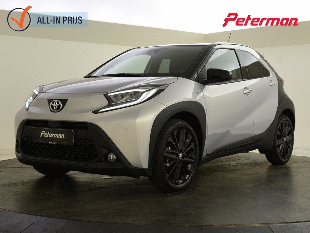 Toyota Aygo X 1.0 VVT-i S-CVT JBL Bi-Tone | Halfleer | PDC |, Auto's, Gebruikt, Euro 6, Overige kleuren, 4 stoelen