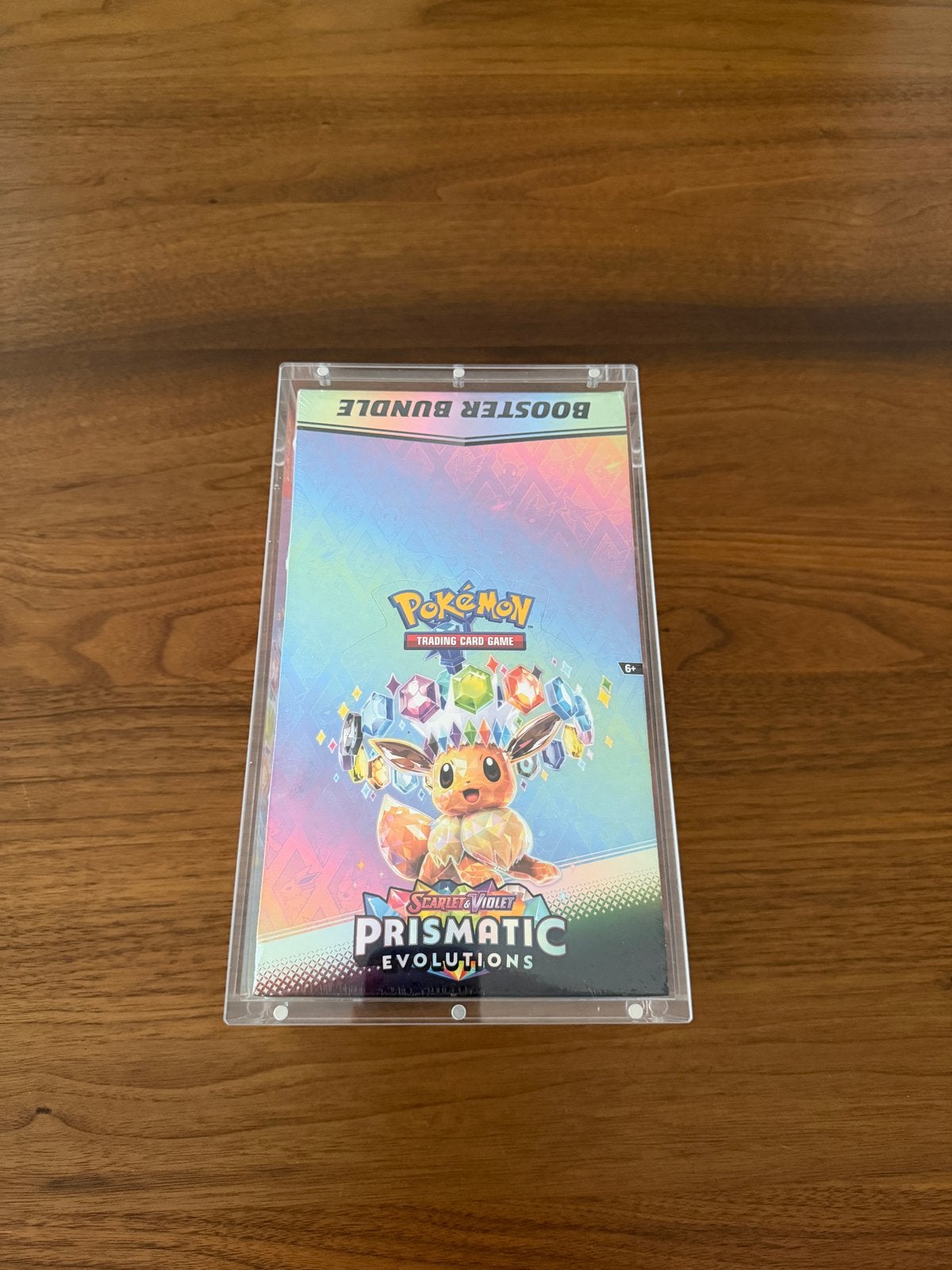 Prismatic Evolutions Booster Bundle Display + Acryl, Ophalen of Verzenden, Nieuw, Meerdere kaarten